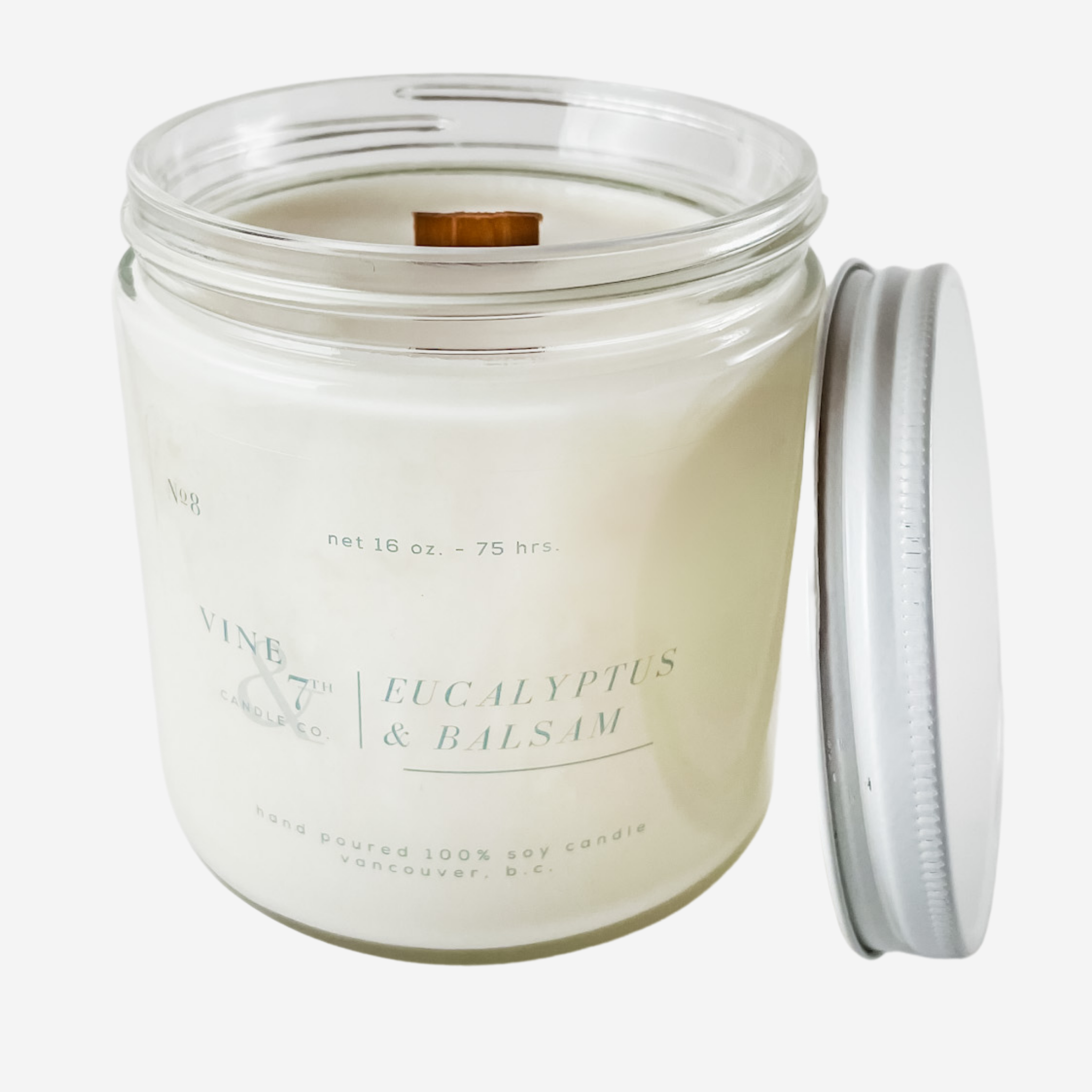 wood wick eucalyptus and balsam scented soy candle in a glass jar with lid